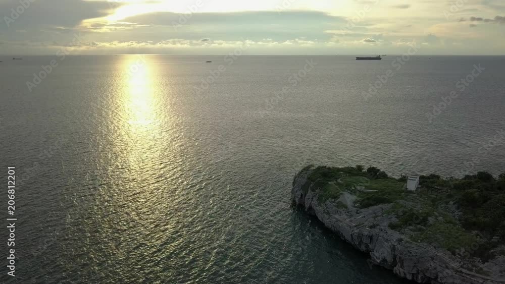 Chong Isariyabhorn (Chong Kao Kad) famous beach sunset point at Sichang island in Thailand. Chong Isariyabhorn (Chong Kao Kad) famous beach sunset point at Sichang island in Thailand.