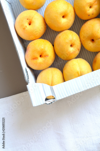 Box of fresh, organic, apricots