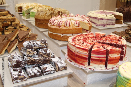 Tableau sur toile A Display of Freshly Made Large and Small Cakes.
