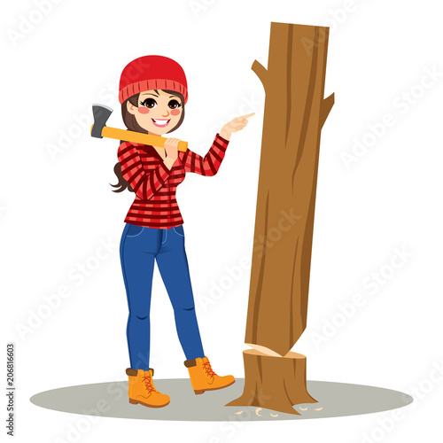 Attractive female lumberjack pushing cut tree easy concept