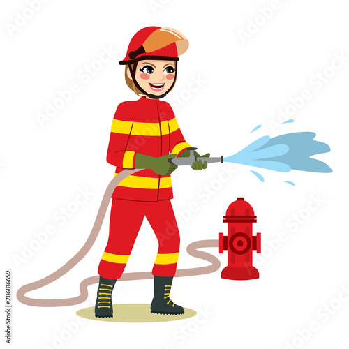 Happy female firefighter standing holding hose throwing water working