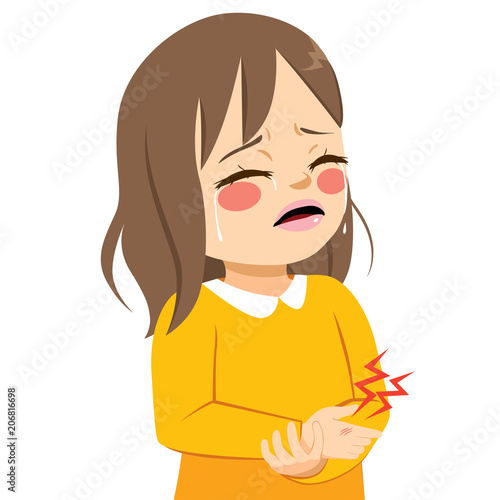 Cute little sad girl crying in pain hurt with injury on hand