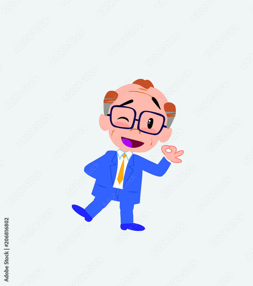 Old businessman with glasses doing the OK sign with his hand. Old businessman with glasses doing the OK sign with his hand.