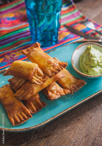 Fried cheese with guakomole appetizer photo