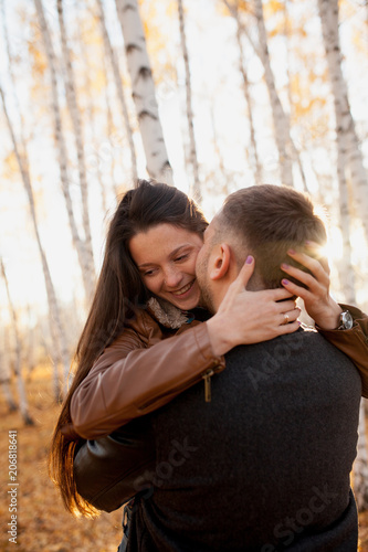embrace couple in love in autumn