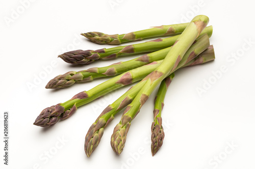 Fresh green asparagus on white background.