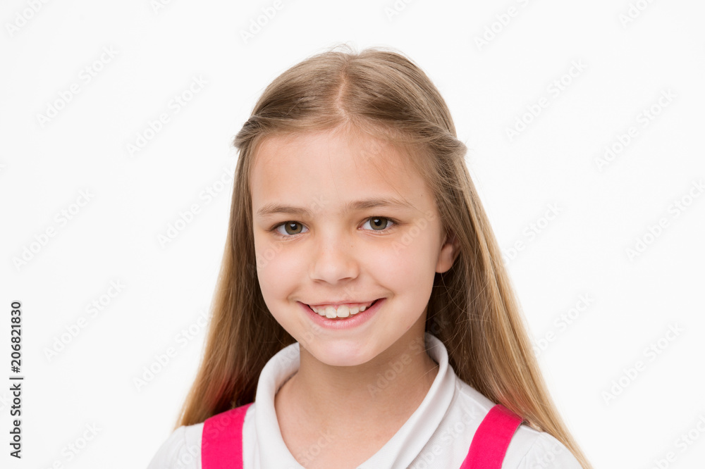 Child with cute face isolated on white. Little girl smile with fresh skin. Beauty kid with fresh look and long blond hair. Beauty look and skincare. Happy childhood and childcare Child with cute face isolated on white. Little girl smile with fresh skin. Beauty kid with fresh look and long blond hair. Beauty look and skincare. Happy childhood and childcare