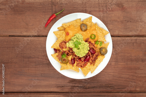 Nachos with cheese and chilli, traditional Mexican snack, with copyspace