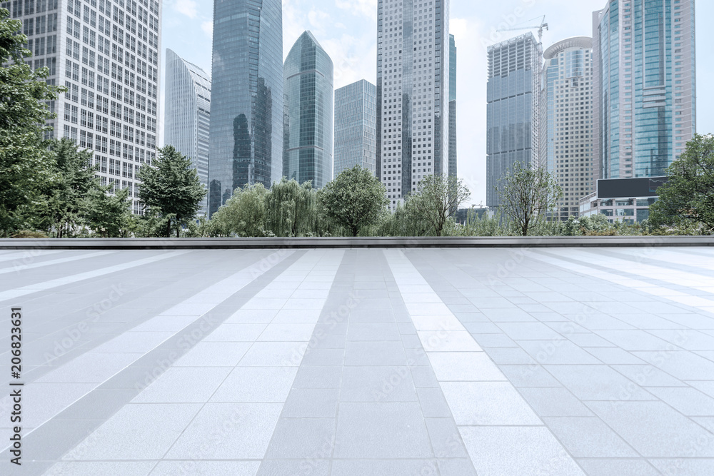 skyscrapers of a modern city with overlooking perspective under blue sky skyscrapers of a modern city with overlooking perspective under blue sky