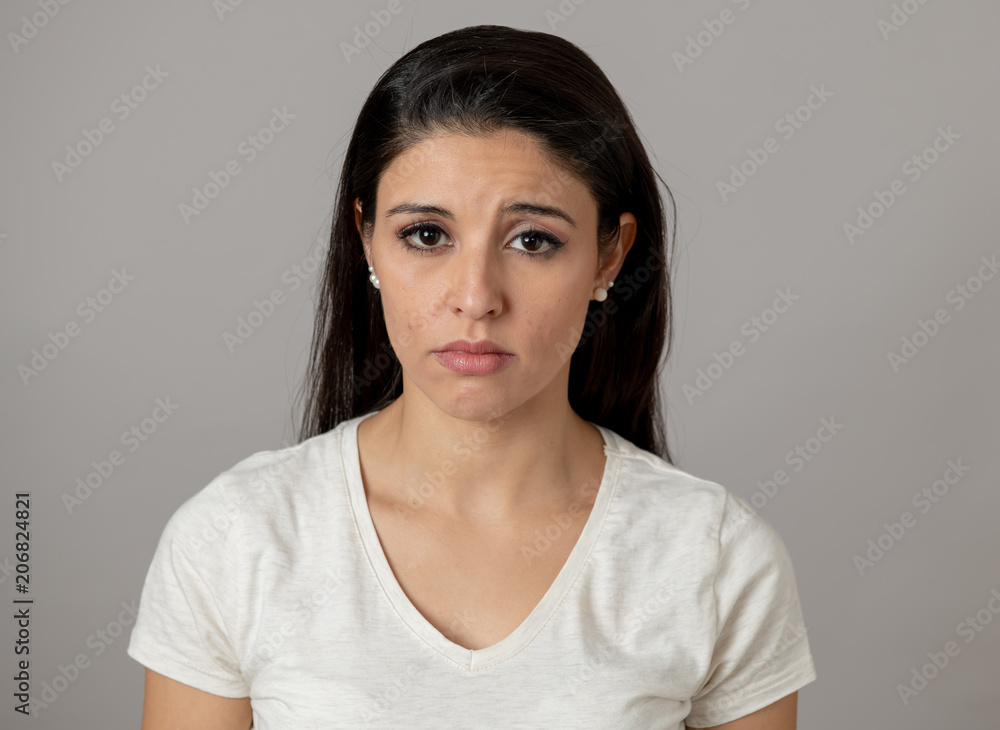 Fotografia do Stock: Human expressions, emotions. Young attractive woman  with a sad face, looking depressed and unhappy | Adobe Stock