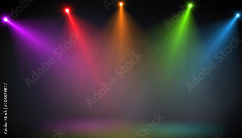 abstract of empty stage with colorful spotlights or Several bright projectors for scene lighting effects . can be used for display or montage your products