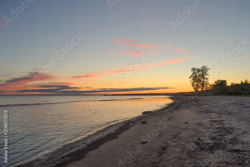 the setting sun on the lake  above the water of the cloud