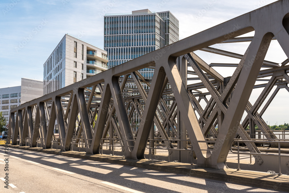 The Magdeburger bridge is a truss bridge crossing a watercourse in the new Hafencity of Hamburg