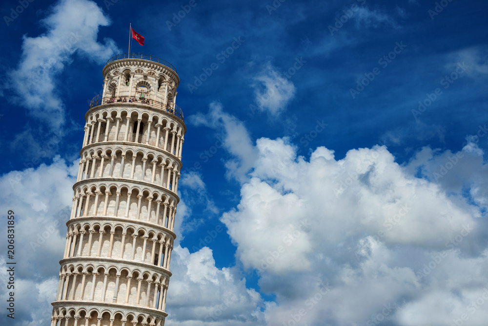 The famous Leaning Tower of Pisa among beautiful clouds