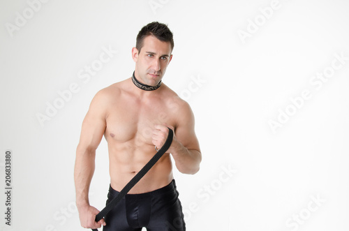 Stripper. Sexy man in a collar.  © vladorlov