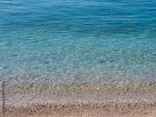 calm beach with clear blue water