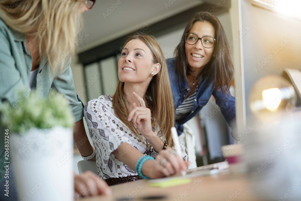 Start-up young women in office, co-working area Start-up young women in office, co-working area