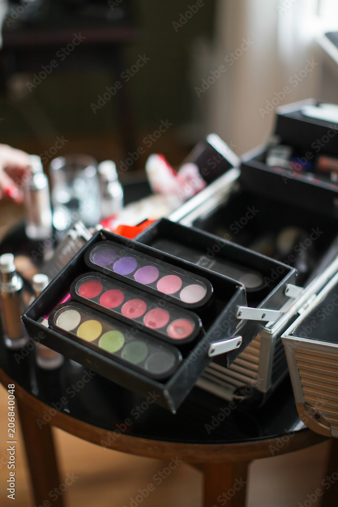 Make up case with cosmetics on the table Make up case with cosmetics on the table