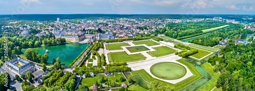 Aerial view of Chateau de Fontainebleau with its gardens, a UNESCO World Heritage Site in France © Leonid Andronov