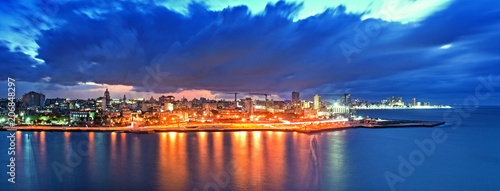 Panoramic View of Havana city and bay at night fell © javier
