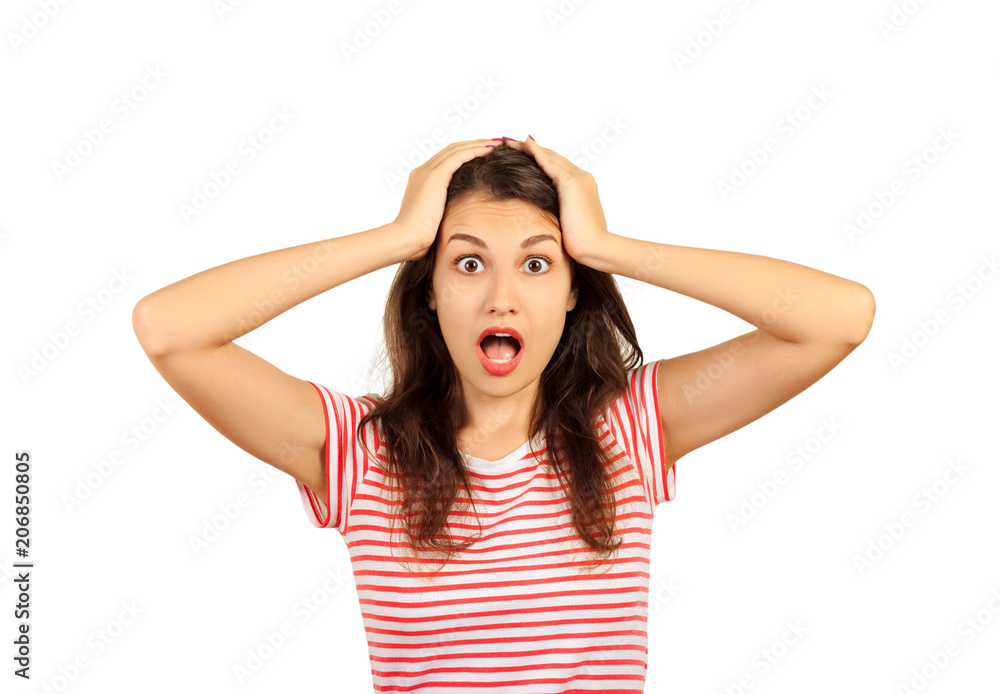 portrait of pretty positive and surprised girl in striped outfit holding arms on head, looking at camera with wide open mouth. emotional girl isolated on white background portrait of pretty positive and surprised girl in striped outfit holding arms on head, looking at camera with wide open mouth. emotional girl isolated on white background