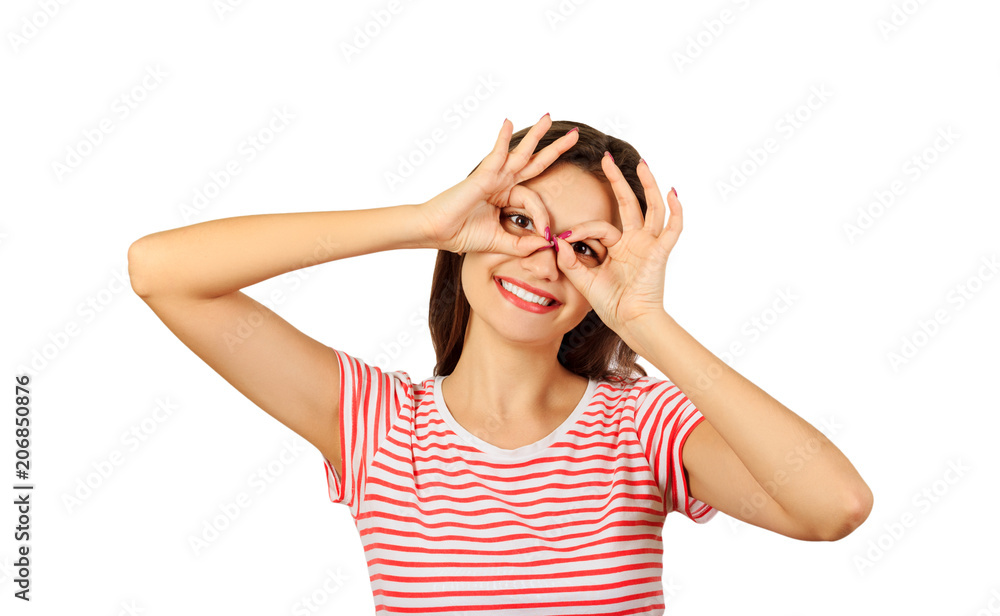 Cheerful girl holding fingers near eyes like glasses. emotional girl isolated on white background Cheerful girl holding fingers near eyes like glasses. emotional girl isolated on white background