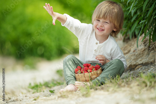 Child with strawberries
