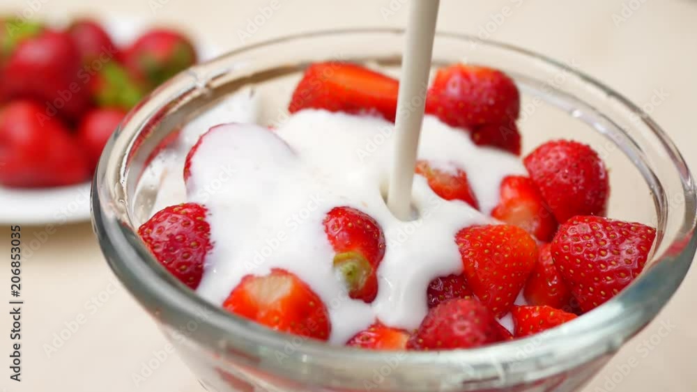 Fresh strawberries with yogurt in a bowl Fresh strawberries with yogurt in a bowl