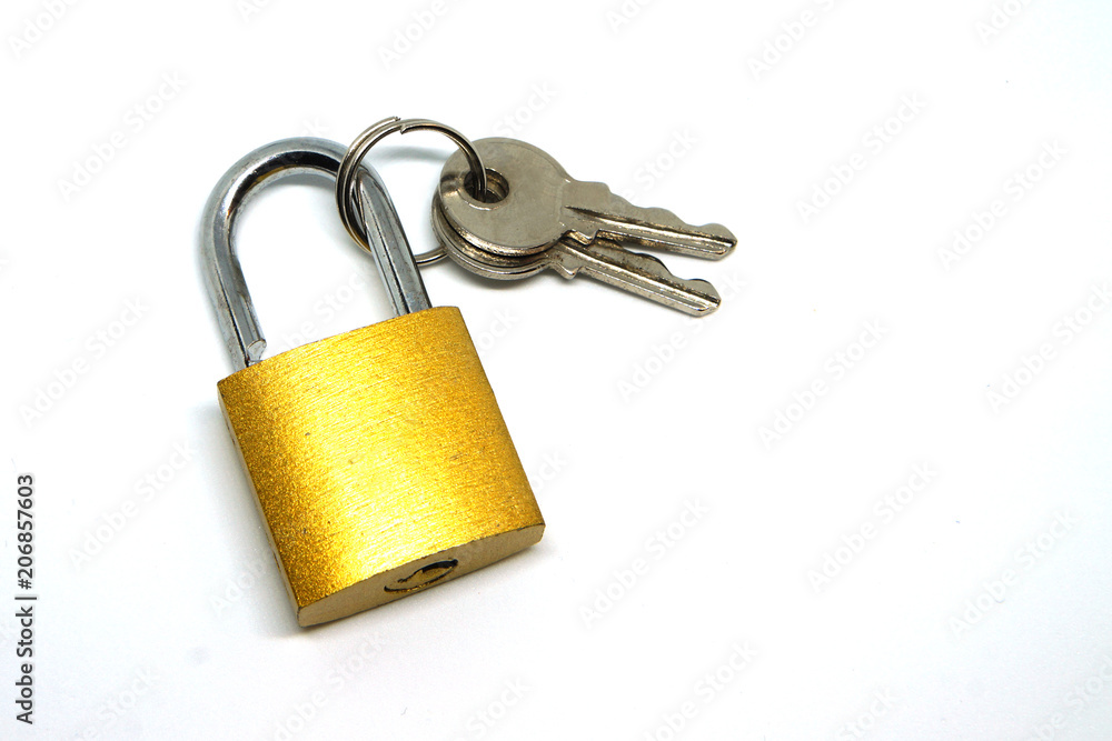 the golden padlock and bunch of keys on the white isolated background the golden padlock and bunch of keys on the white isolated background