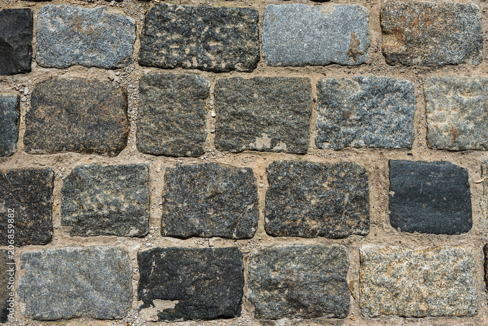 Old paving and square stones - retro background Old paving and square stones - retro background