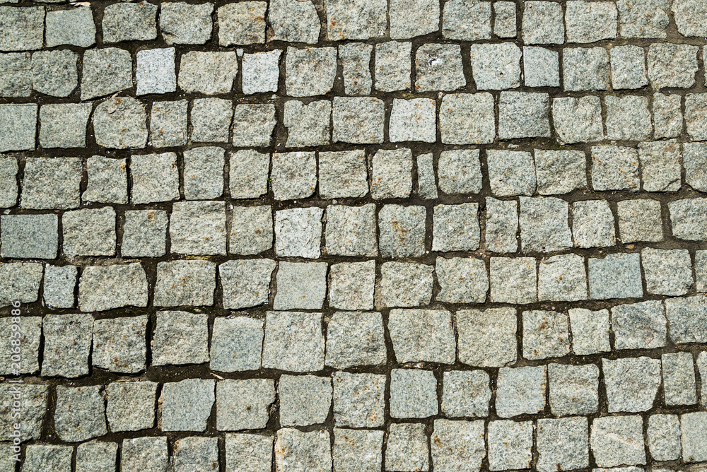 Old paving and square stones - retro background