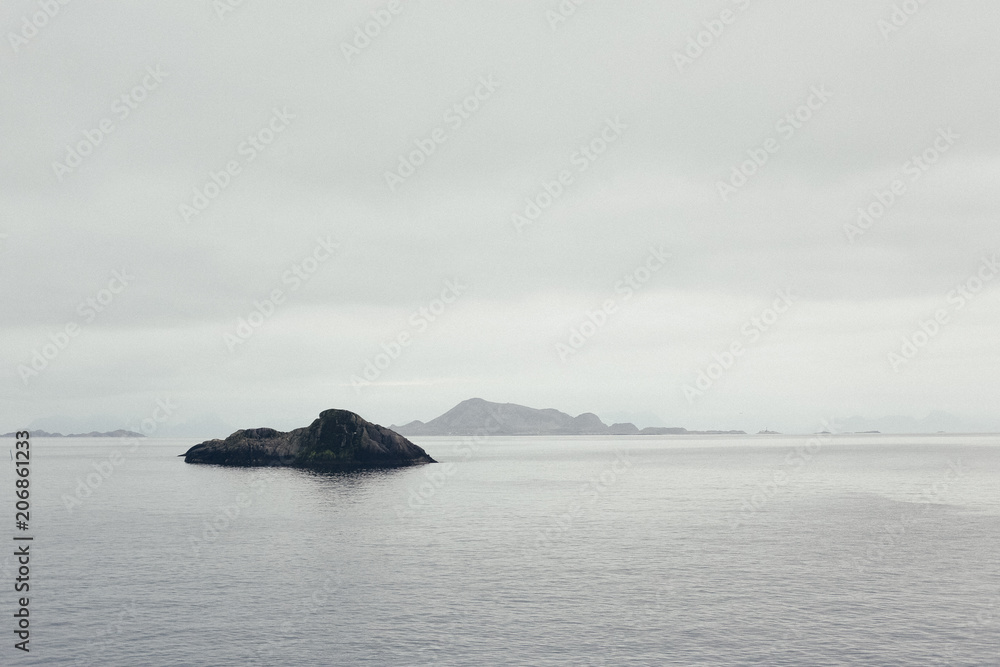 North sea with cold and snow view of the horizon and rocky coast North sea with cold and snow view of the horizon and rocky coast