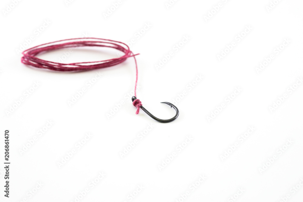 Fishing hook with a red rope on a white background.