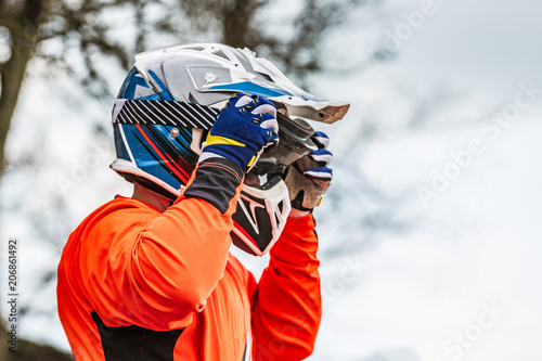 rider wears a protective helmet © Georgii