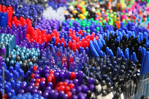 Automatic ballpoint pen. School supplies, stationery accessories. Colorful stationery. Stationery store. Goods for office and study.