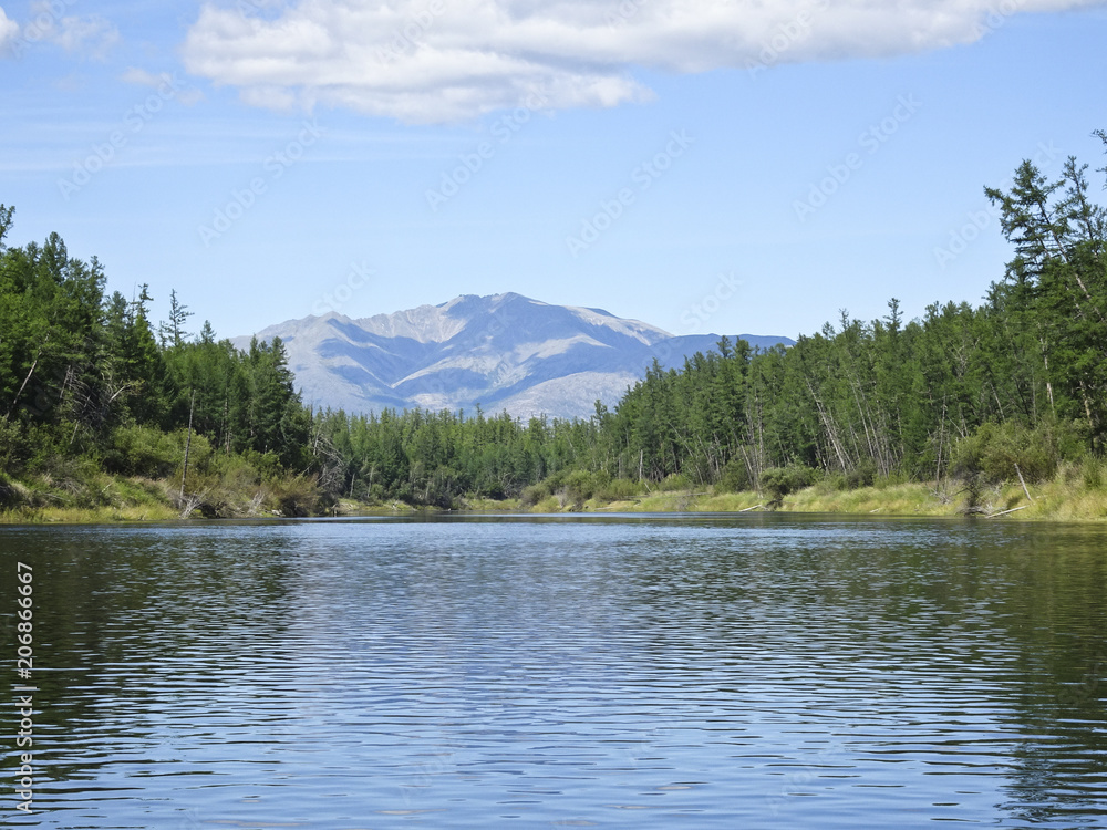 Landscape: calm river and mountains in the background Landscape: calm river and mountains in the background