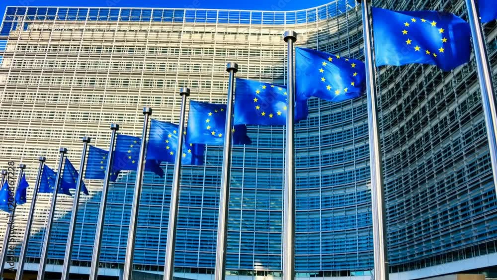 custom made wallpaper toronto digitalWaving EU flags in front of European Commission, Brussels