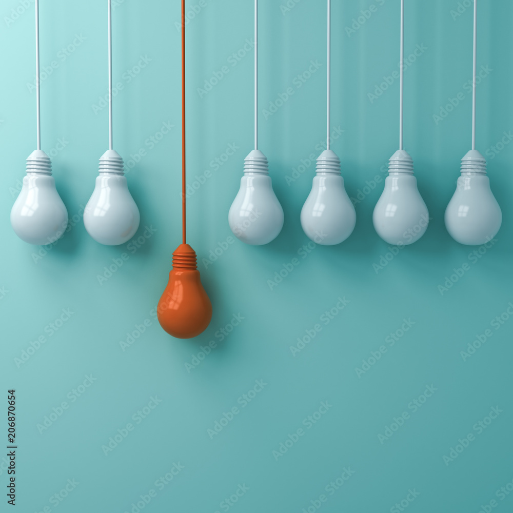Think different concept , One hanging orange light bulb standing out from the white light bulbs on green pastel wall background , leadership and individuality creative idea concepts . 3D rendering. Think different concept , One hanging orange light bulb standing out from the white light bulbs on green pastel wall background , leadership and individuality creative idea concepts . 3D rendering.