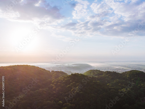 sunrise over mountains. aerial view. new day