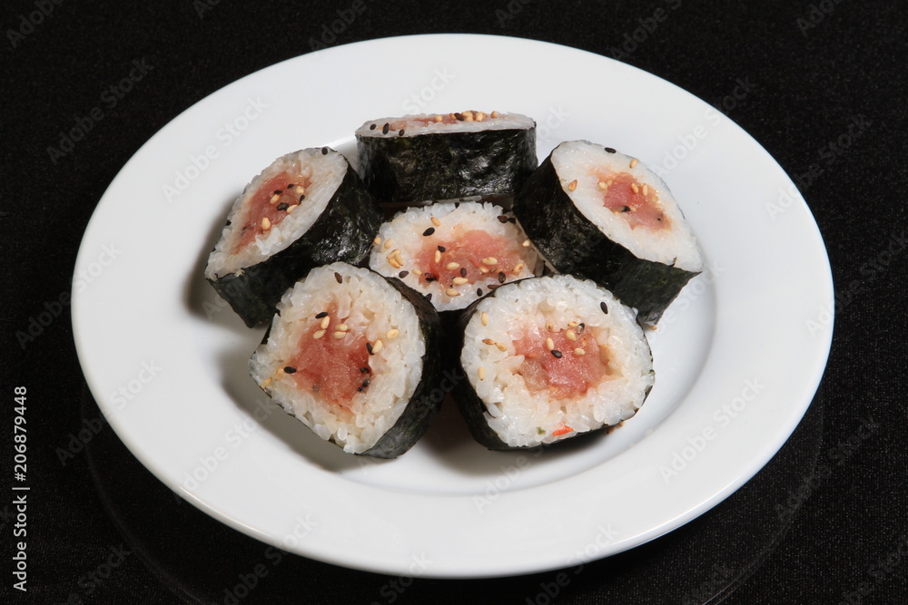 Sushi rolls served on a plate