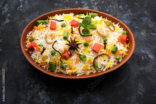 Punjabi Kadhi Pakoda or curry Pakora, Indian cuisine served in a bowl or karahi, selective focus