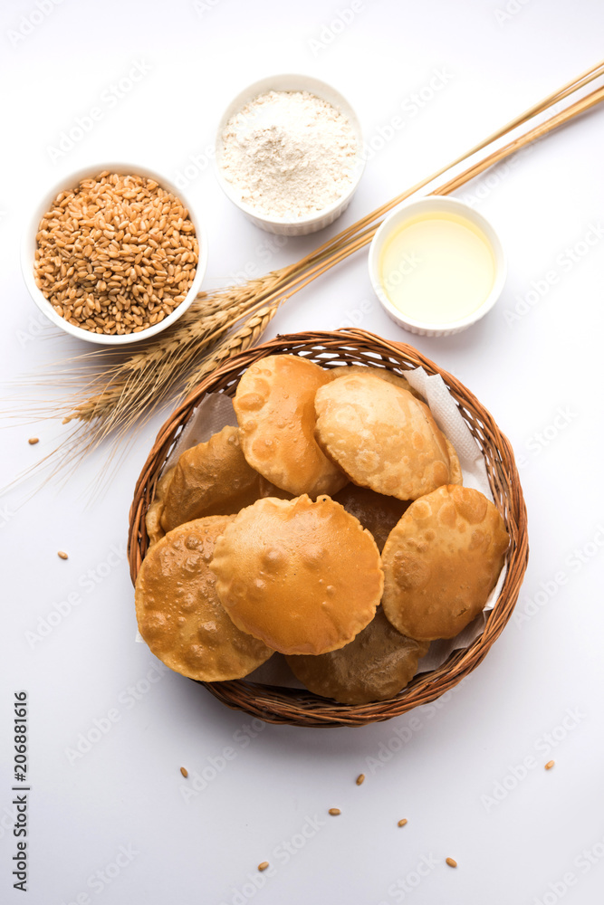Homemade Fried Puri or Poori Or Indian Bread, selective focus Homemade Fried Puri or Poori Or Indian Bread, selective focus