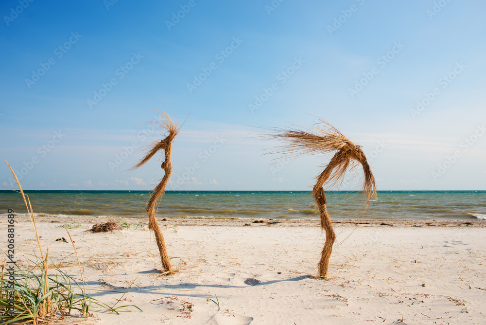 Two palm trees on the tropical beach