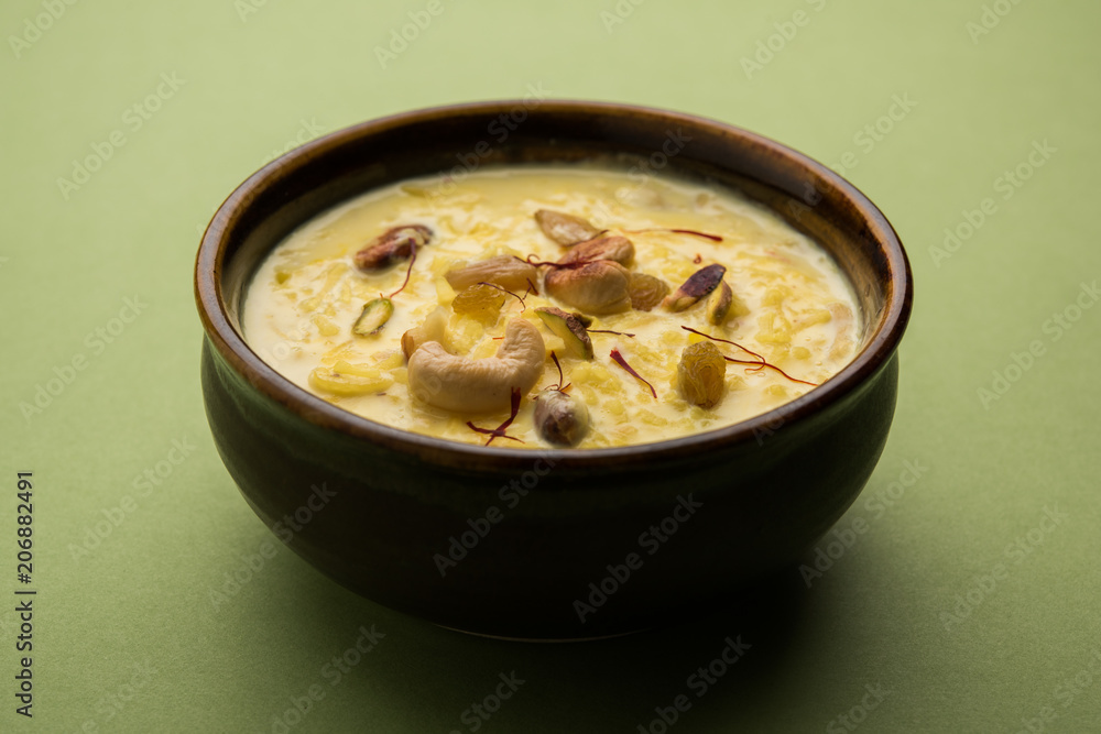 Indian sabzi / vegetable fried recipes served in white bowl over moody or colourful background. selective focus Indian sabzi / vegetable fried recipes served in white bowl over moody or colourful background. selective focus