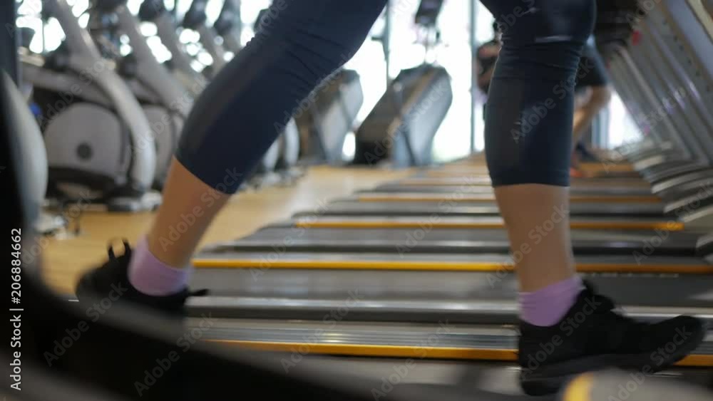 fitness gym people cardio running on treadmill workout in sport club center. fitness gym people cardio running on treadmill workout in sport club center.