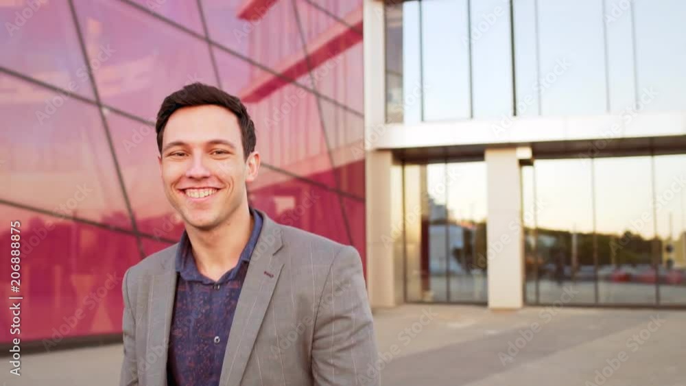 Funny young businessman dancing, happy expression Funny young businessman dancing, happy expression