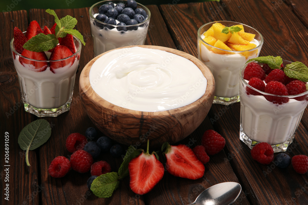 Yogurt and berry. Fresh fruit yogurt with fresh berries and peaches Yogurt and berry. Fresh fruit yogurt with fresh berries and peaches