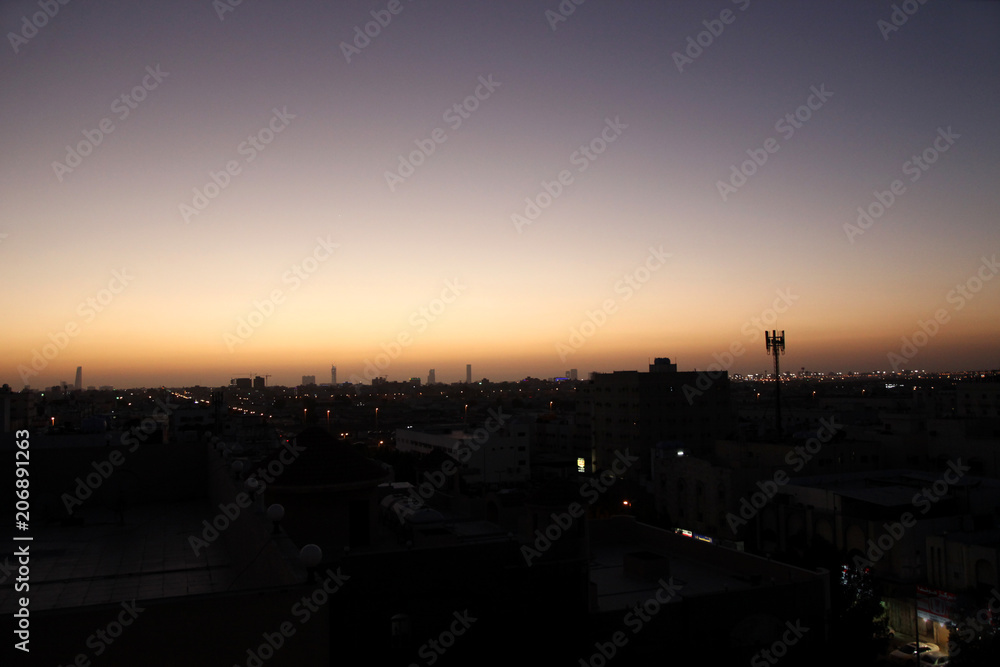 Fototapeta premium Sunset scene with buildings silhouette in countryside of Jeddah, Saudi arabia