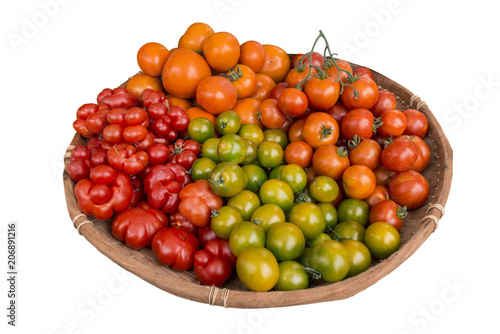 Isolated basket with tomato variety 