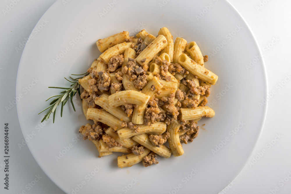 Plate of macaroni pasta with Bolognese ragù Plate of macaroni pasta with Bolognese ragù
